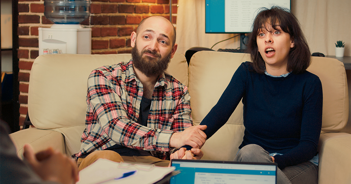 Couple discussing issues in houston couples therapy