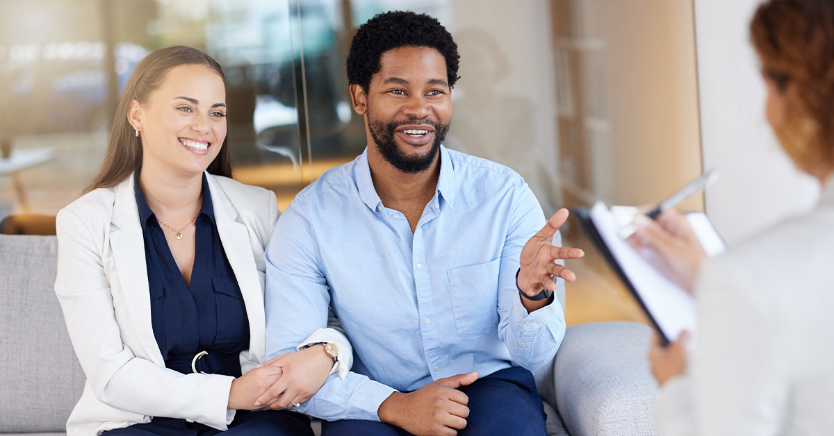Happy couple in couples counseling